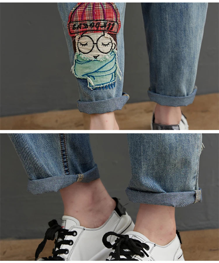 Women's Cartoon Embroidery Denim Pants – Casual High-Waist Harem Style with Pockets and Trendy Distressed Details.