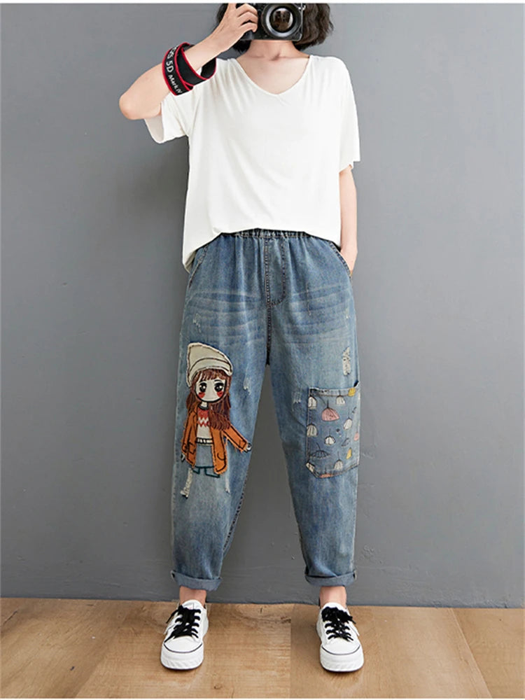 Women's Cartoon Embroidery Denim Pants – Casual High-Waist Harem Style with Pockets and Trendy Distressed Details.