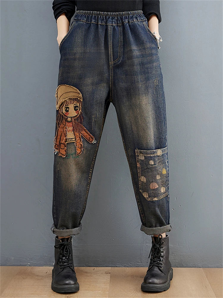 Women's Cartoon Embroidery Denim Pants – Casual High-Waist Harem Style with Pockets and Trendy Distressed Details.
